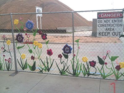 Denver construction fencing yarn-bombing