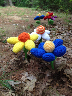 Sits n Knit’s sprouting flowers yarn-bombing display